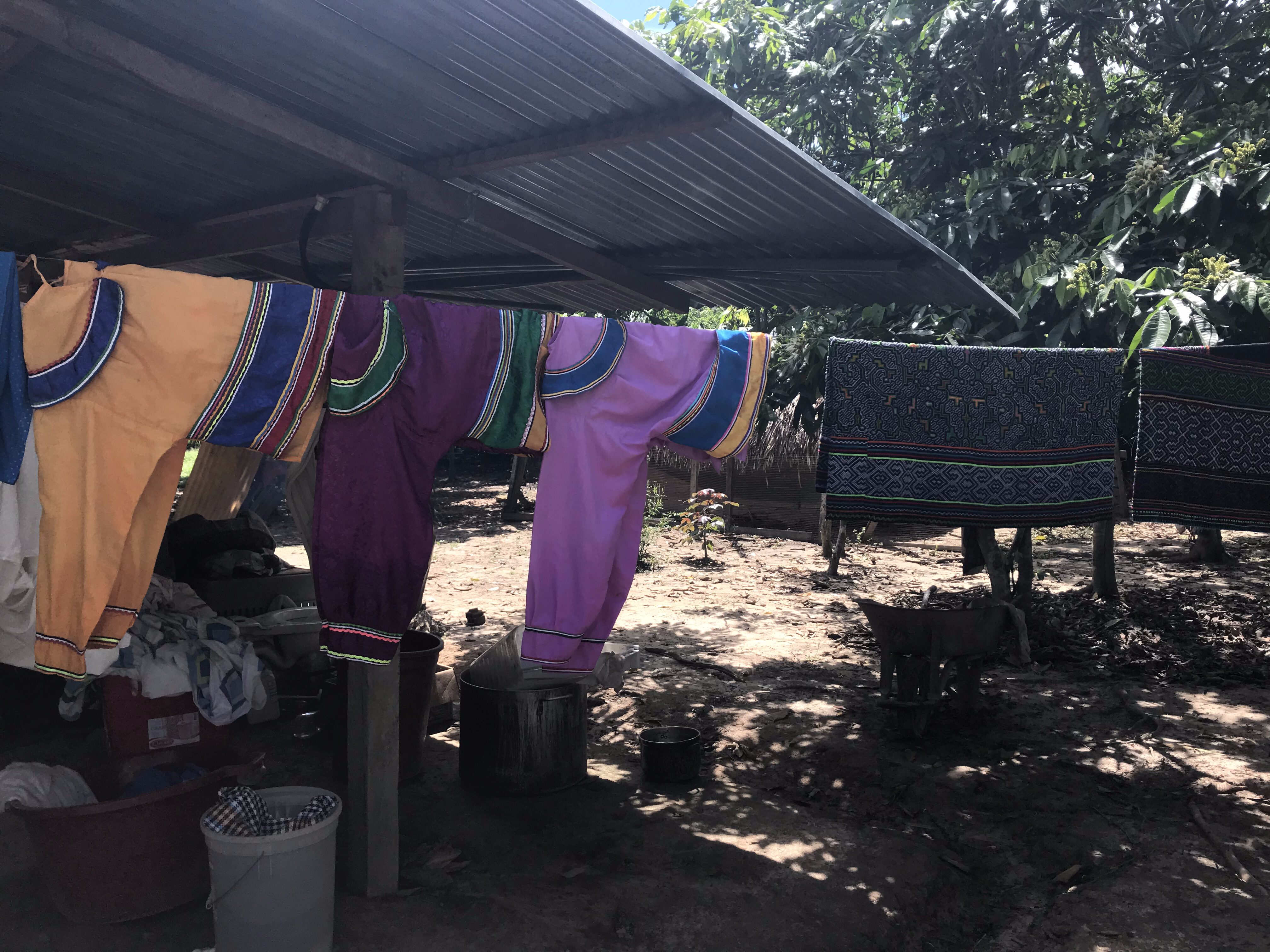 Traditional Shipibo textiles featuring intricate geometric patterns representing energetic healing pathways.