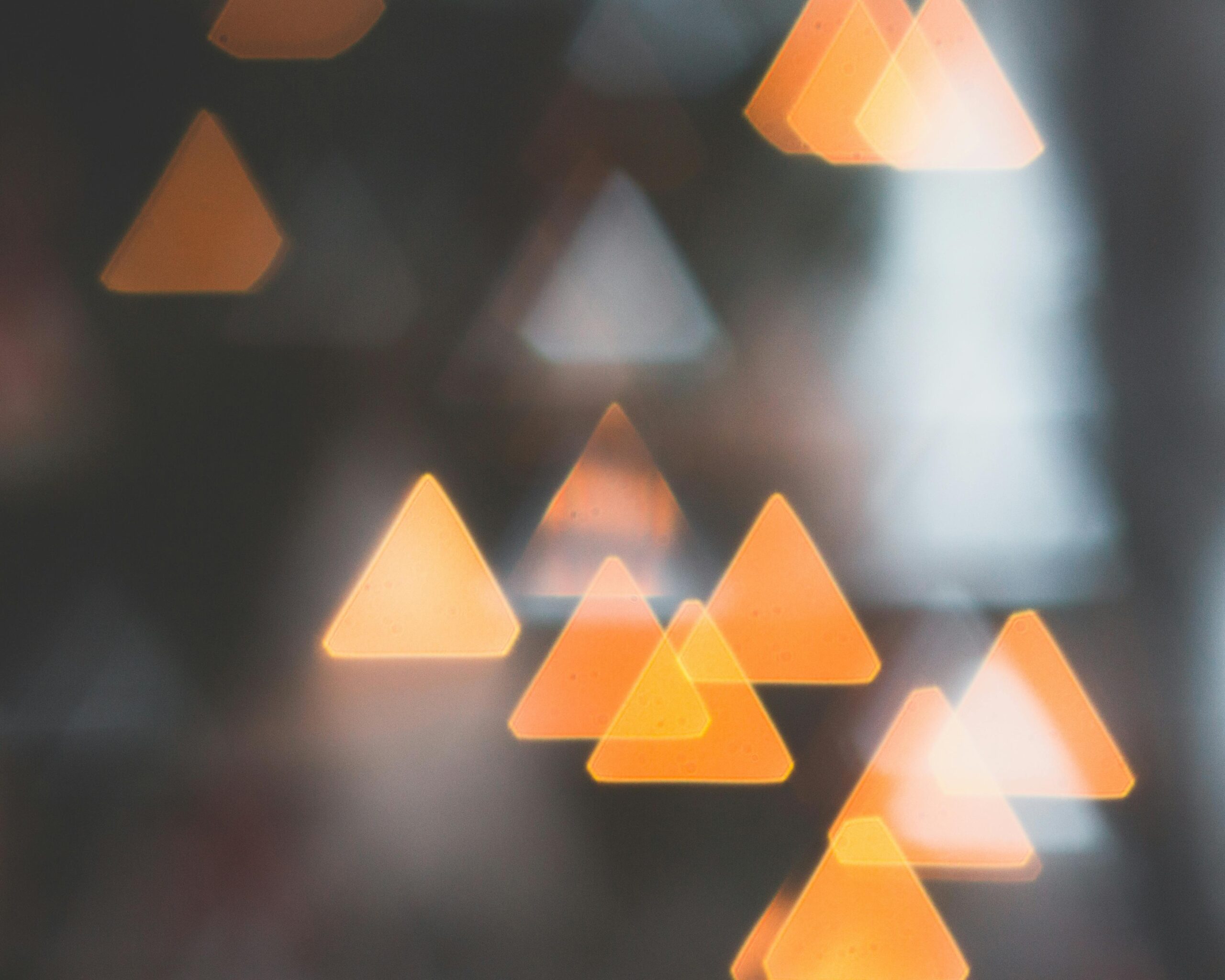 light orange triangles to represent the idea of triad